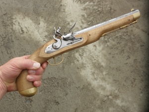 A .50 Caliber Flintlock Pirate Pistol purchased by the author.  The manufacture of traditional hunting rifles is not the concern, nor the cottage industry of small-time, custom gun makers. 